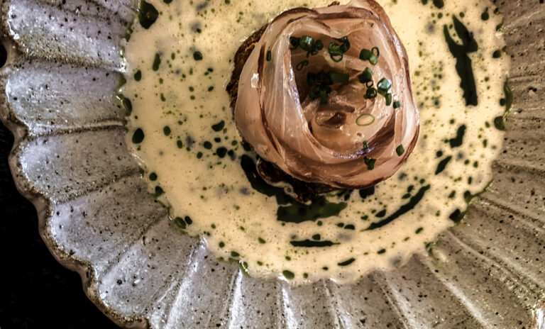 Fish served on sauce