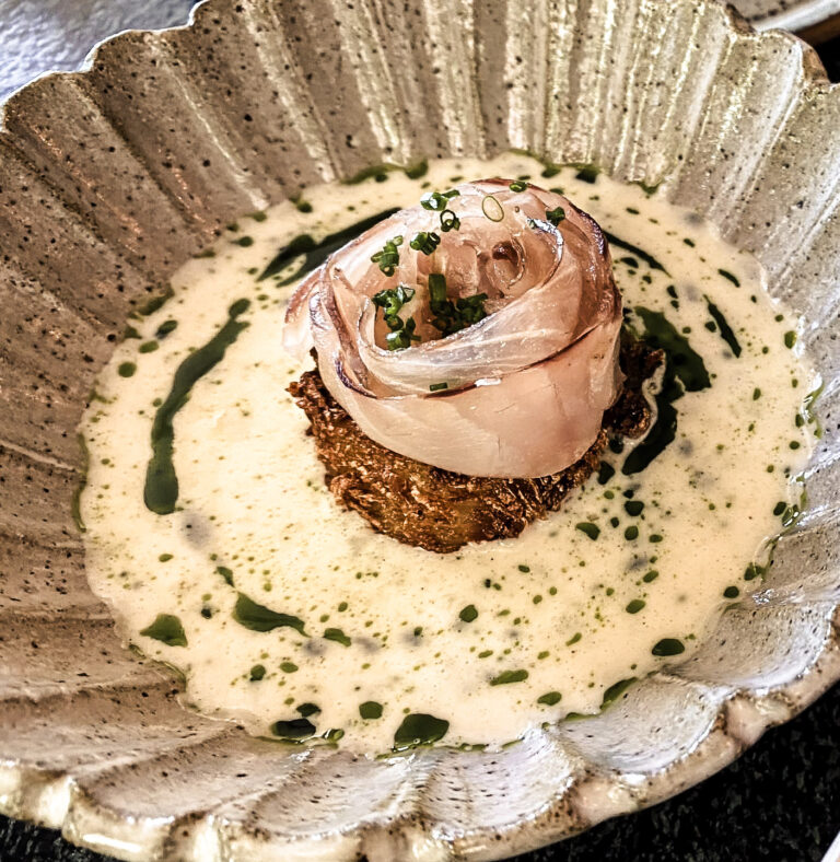 Fish served on sauce